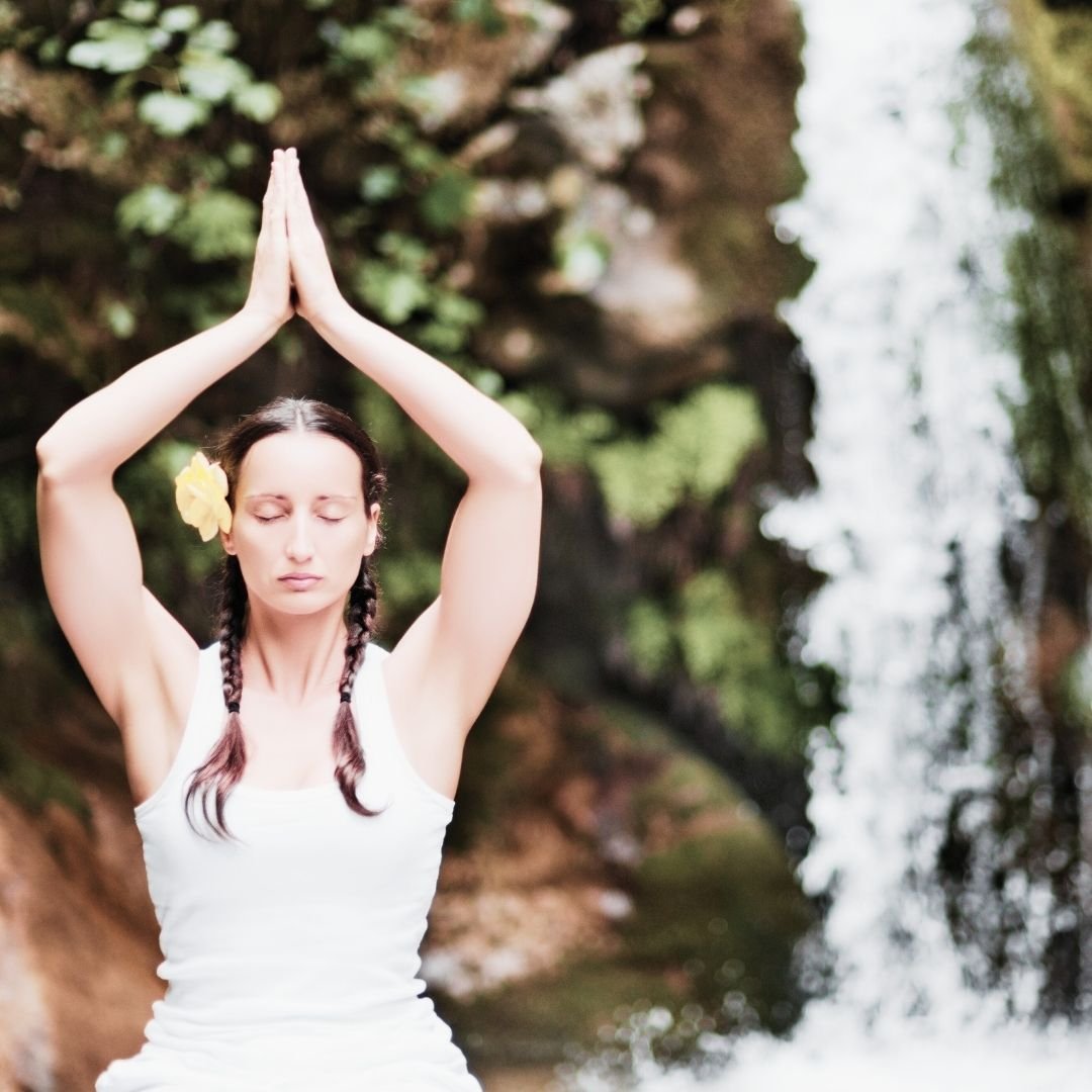 Nurture Intuition woman with hands at heart