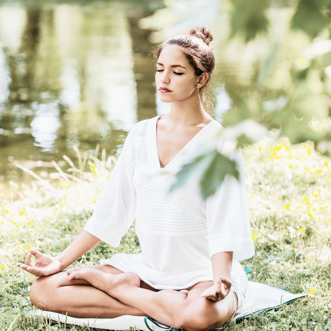 four fold breath woman with hands at heart