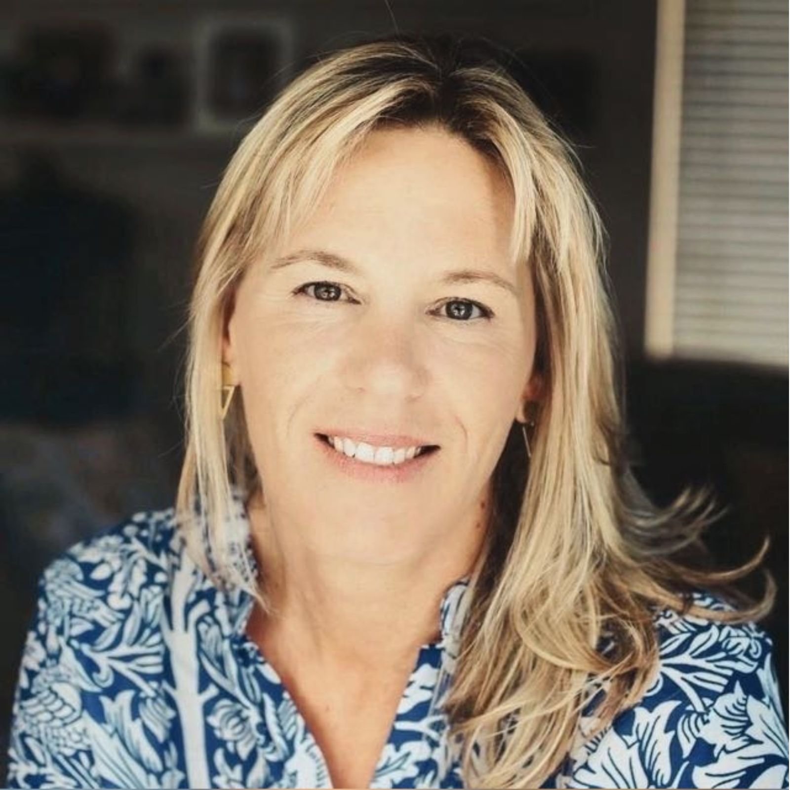 Kate Spreckley smiling, founder of Spirit Pathways