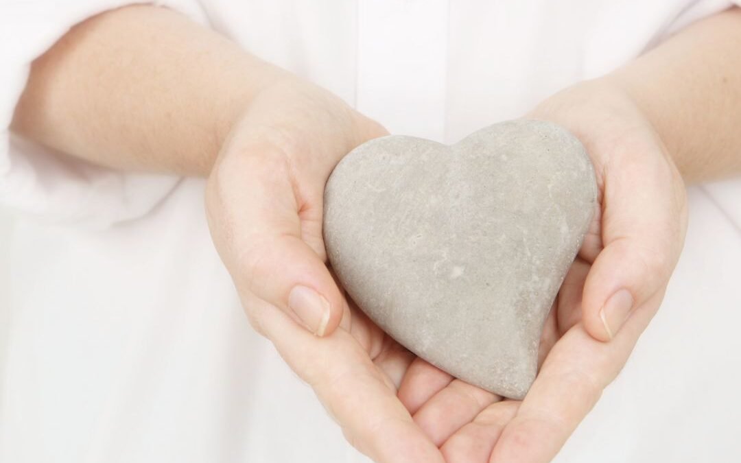 hands holding a heart