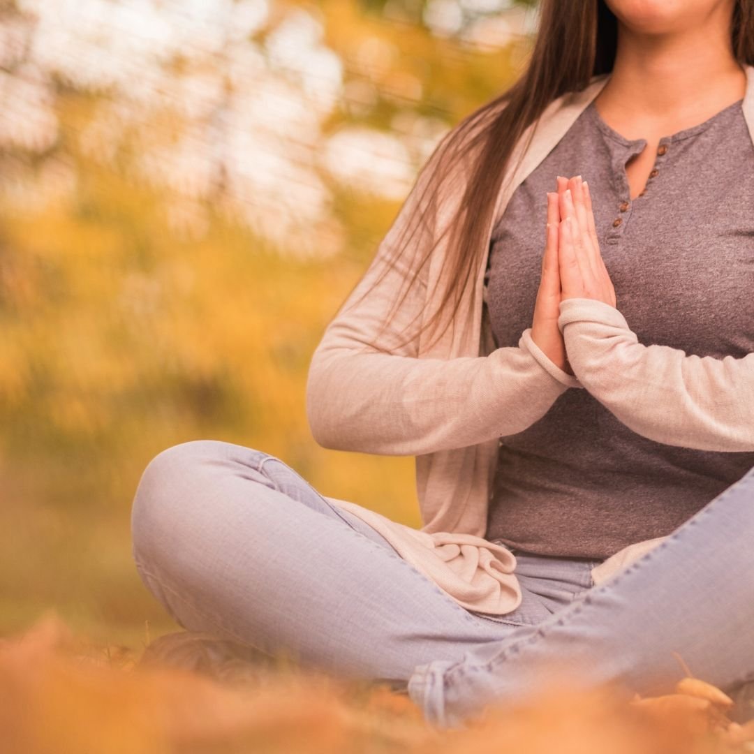 shift woman with hands at heart