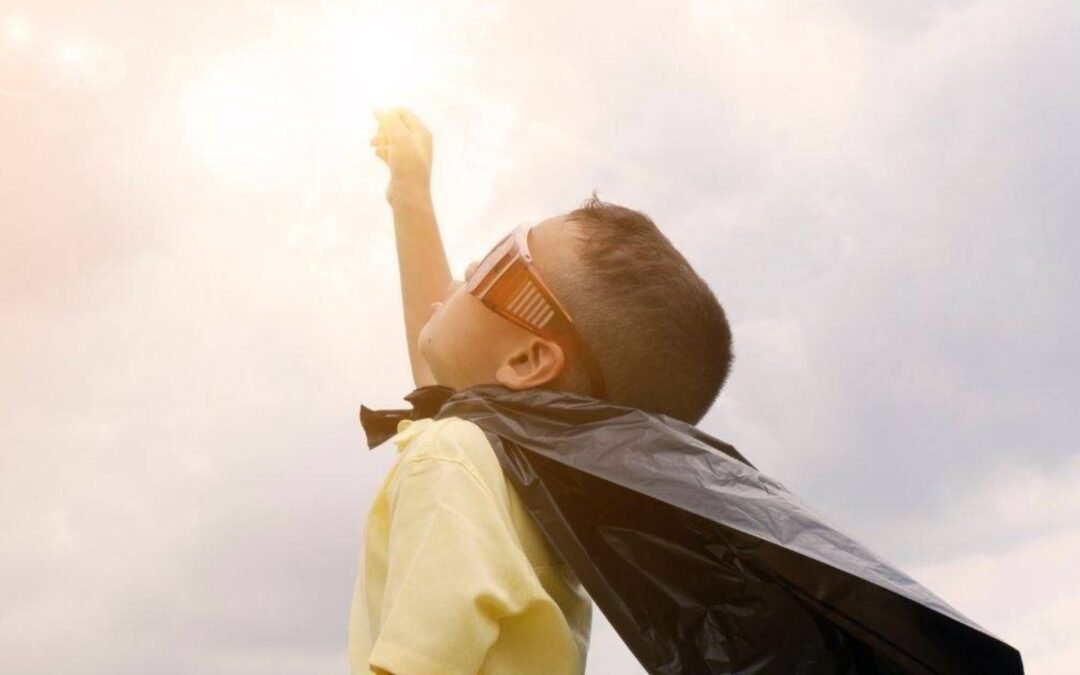 child with cape