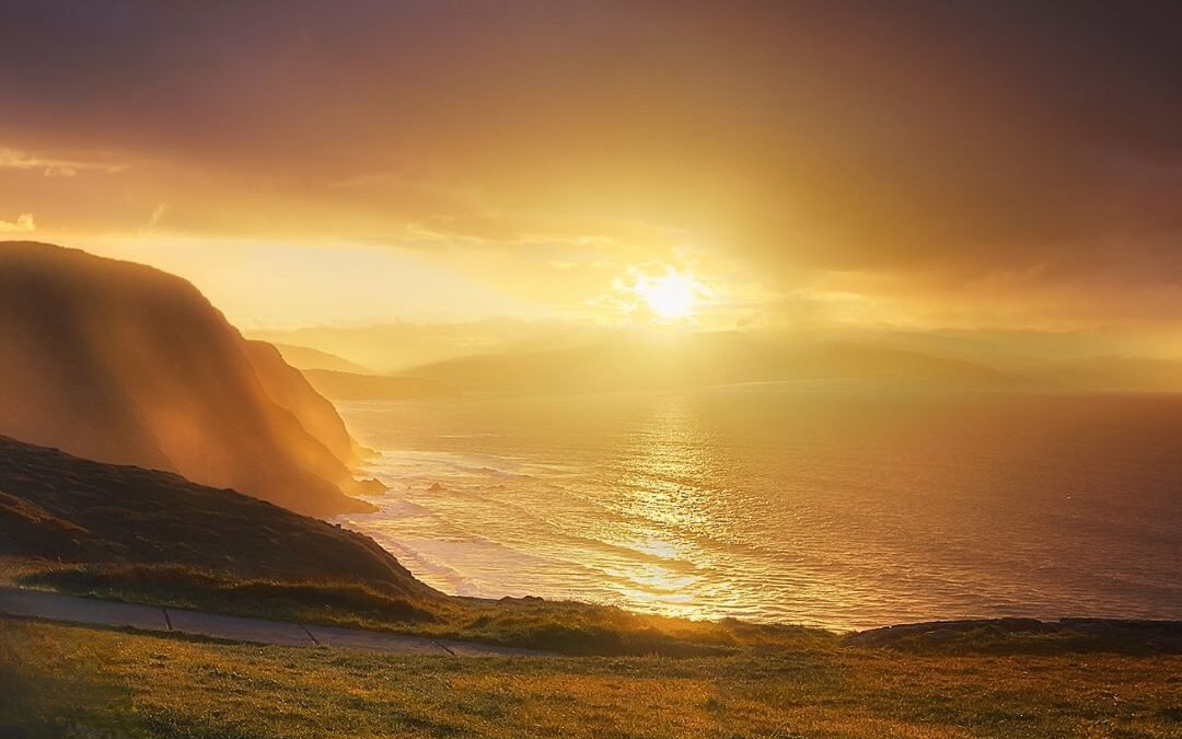 sun through storm clouds